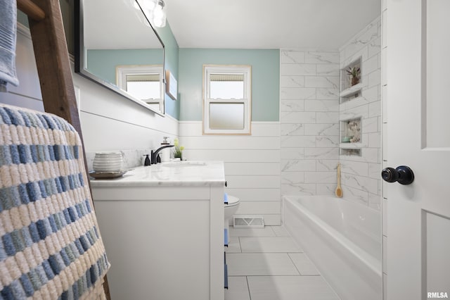 full bathroom with toilet, shower / bath combination with curtain, a wainscoted wall, and vanity