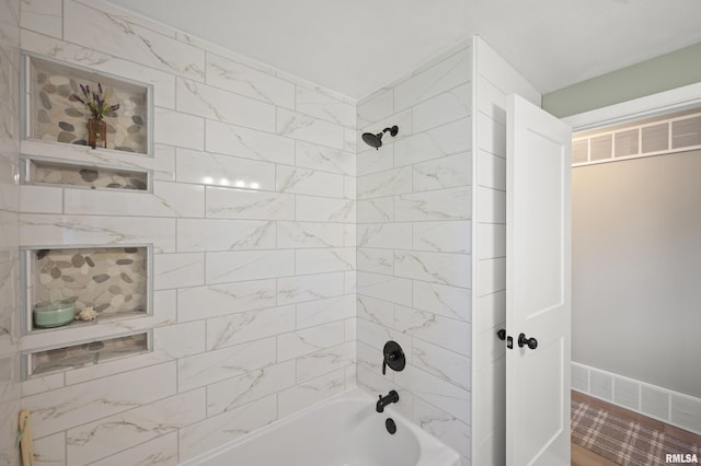 full bath with shower / tub combination