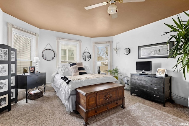 1122 N Broad St, Galesburg, IL 61401 - bedroom with light carpet and a ceiling fan