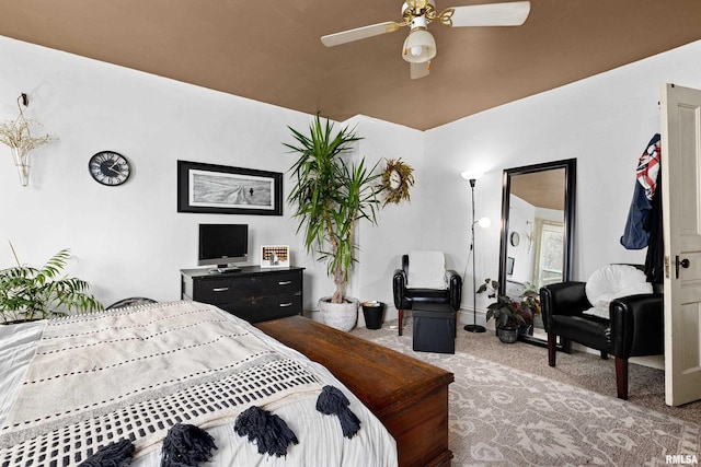 1122 N Broad St, Galesburg, IL 61401 - carpeted bedroom with a ceiling fan