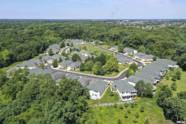 5727 W Woodbriar Ln, Peoria, IL 61615 - aerial overview of property's location with a heavily wooded area and nearby suburban area