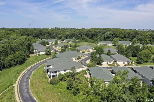 5727 W Woodbriar Ln, Peoria, IL 61615 - aerial view of property and surrounding area with nearby suburban area and a heavily wooded area