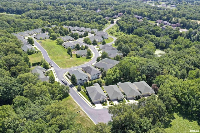 5727 W Woodbriar Ln, Peoria, IL 61615 - aerial view of residential area featuring a forest