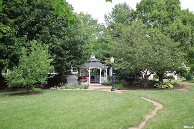 5727 W Woodbriar Ln, Peoria, IL 61615 - view of grassy yard featuring a gazebo