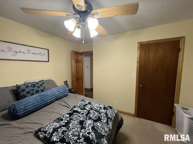 1520 E Wheeler St, Macomb, IL 61455 - bedroom with a ceiling fan and carpet