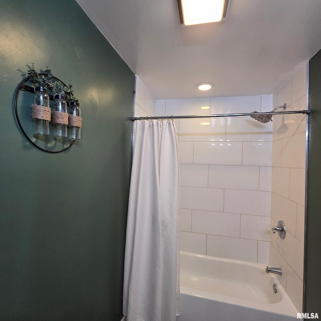 bathroom featuring shower / bathtub combination with curtain