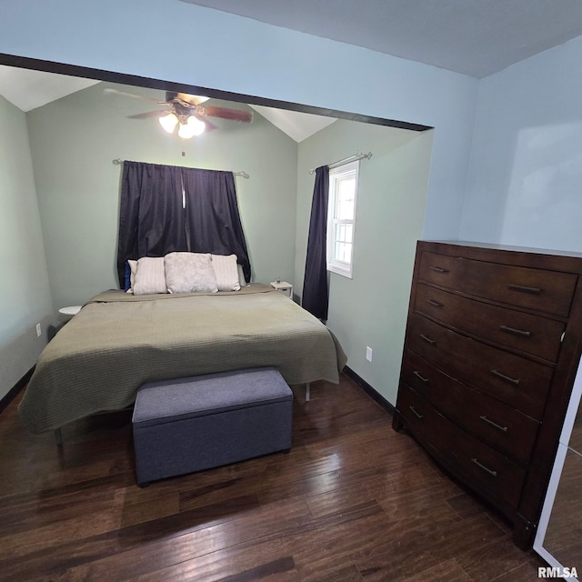 bedroom featuring ceiling fan, vaulted ceiling, and dark wood-type flooring