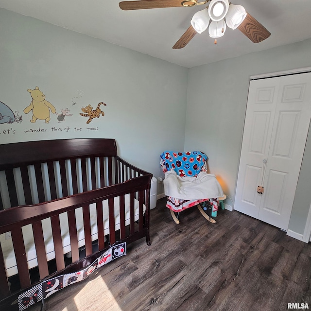 bedroom with baseboards, a ceiling fan, and wood finished floors