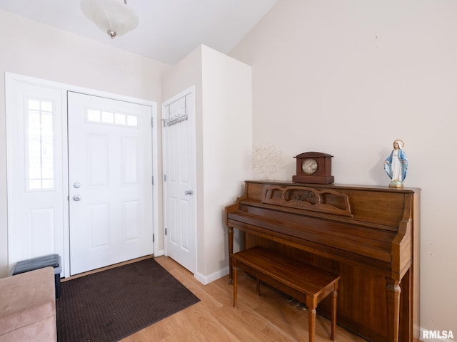 entrance foyer featuring light wood-style floors