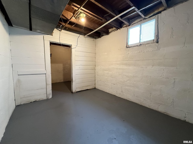 below grade area with concrete block wall