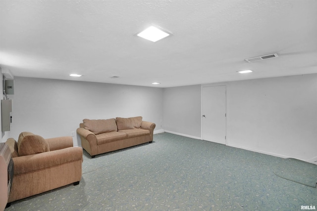 living area featuring visible vents