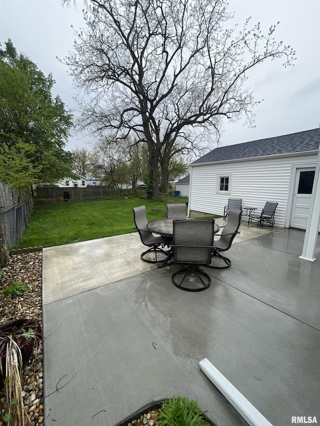 view of patio featuring a fenced backyard and outdoor dining space