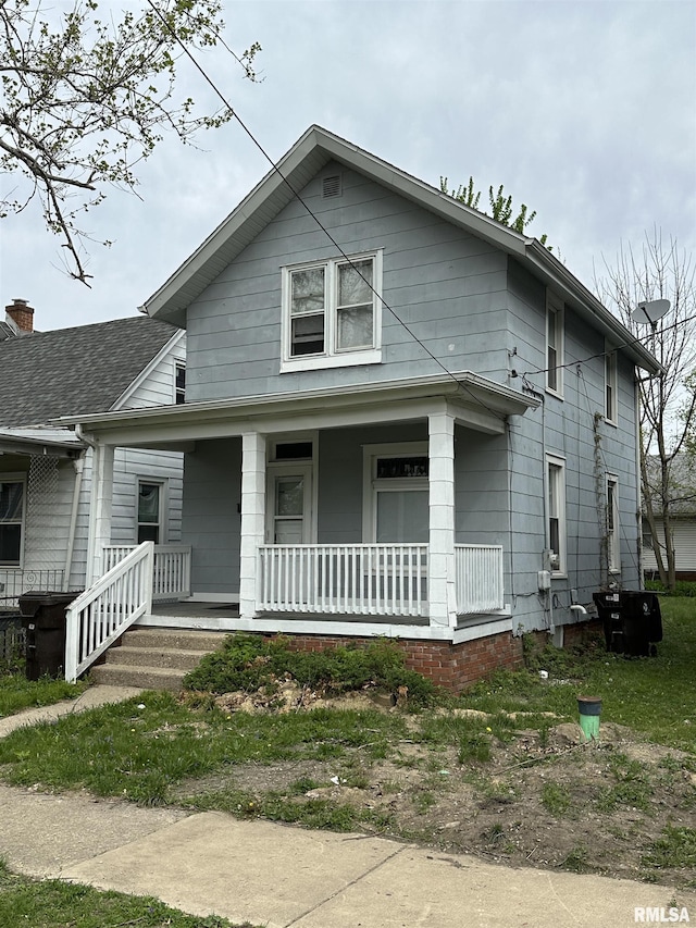 bungalow-style home with a porch