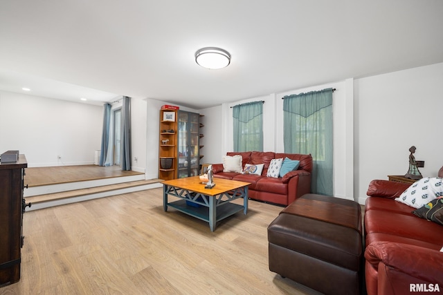 living room featuring recessed lighting and wood finished floors