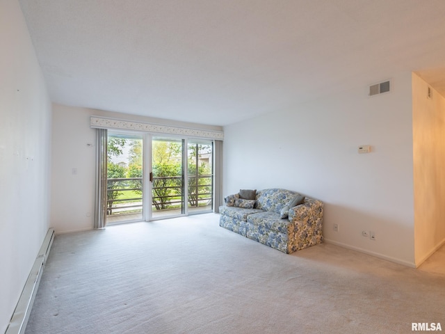 living area with carpet flooring, baseboards, visible vents, and a baseboard radiator