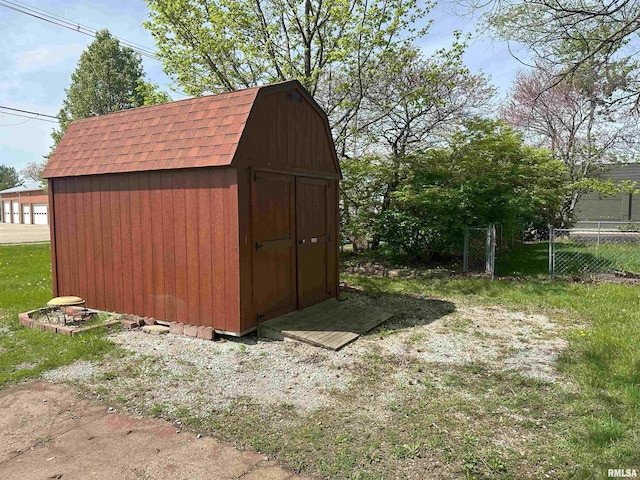 view of shed with fence