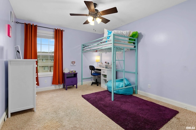 bedroom featuring carpet floors, baseboards, and ceiling fan