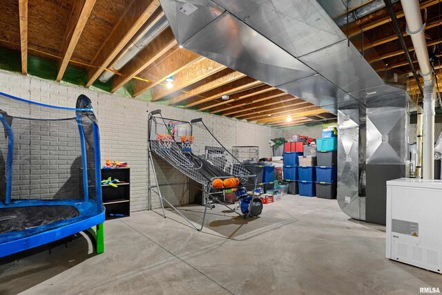 unfinished basement with heating unit