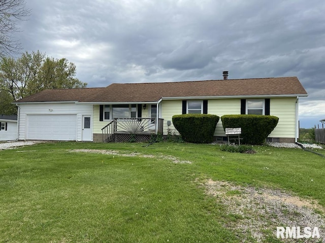 single story home with an attached garage, a front lawn, and covered porch