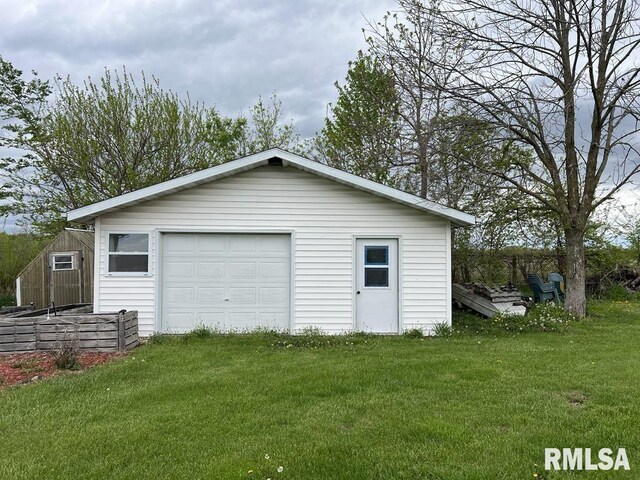 view of detached garage