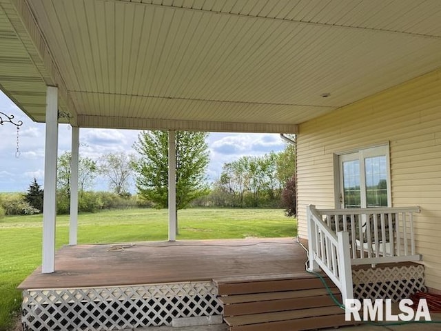 24211 N Carver Rd, Canton, IL 61520 - wooden terrace featuring a lawn