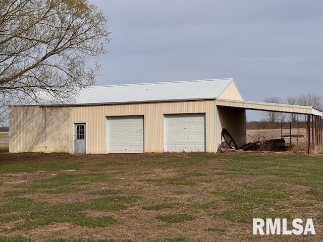 24211 N Carver Rd, Canton, IL 61520 - garage featuring a garage