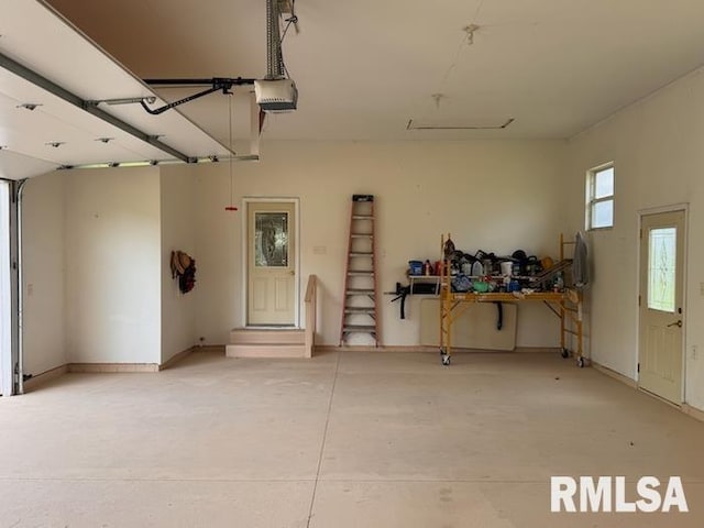 24211 N Carver Rd, Canton, IL 61520 - garage featuring a garage door opener