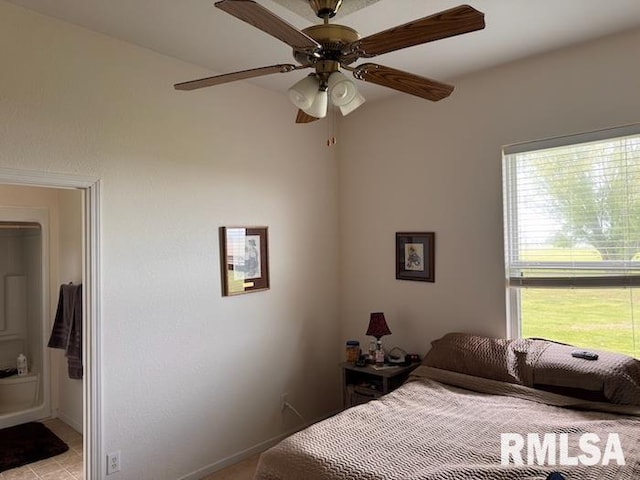 24211 N Carver Rd, Canton, IL 61520 - bedroom with a ceiling fan and baseboards