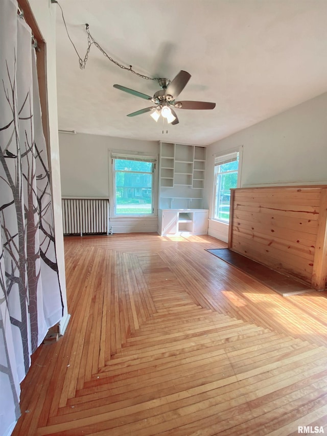301 Cortland Ave, Avon, IL 61415 - bonus room featuring a ceiling fan, radiator, and built in features