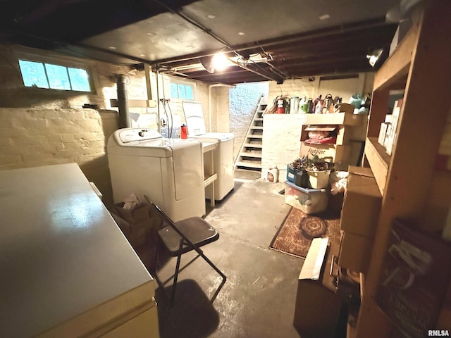 basement with washing machine and clothes dryer