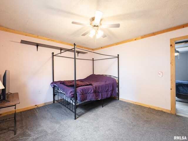 bedroom with baseboards, a textured ceiling, ceiling fan, and carpet floors