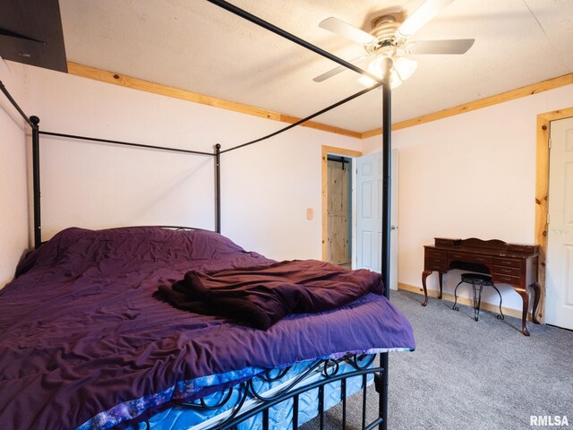 bedroom with baseboards, carpet flooring, and ceiling fan