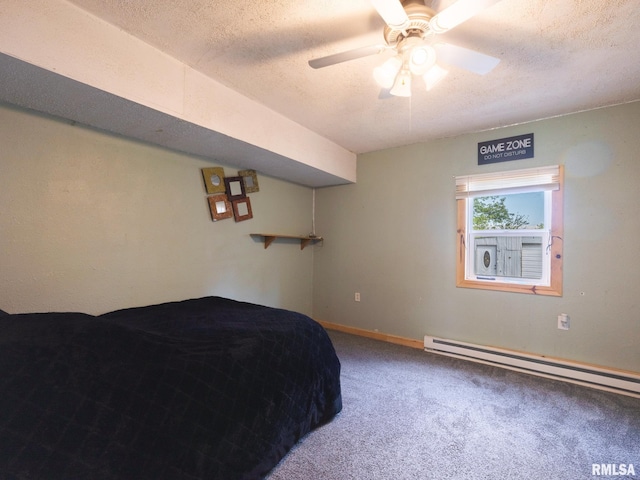 carpeted bedroom with a ceiling fan, a textured ceiling, baseboards, and a baseboard radiator