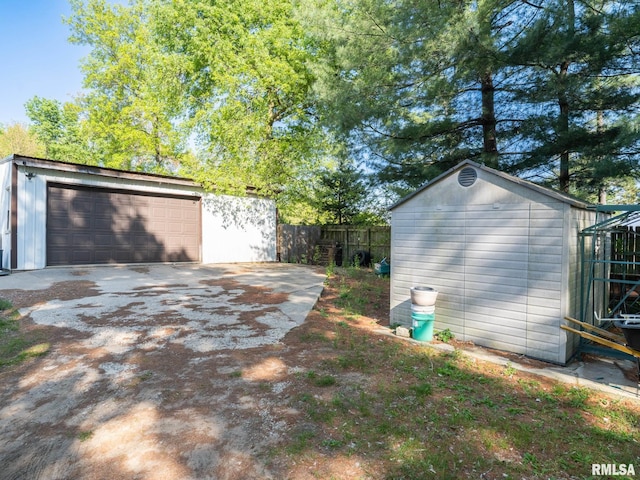 detached garage with fence
