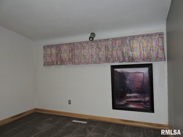 detailed view of baseboards and carpet flooring