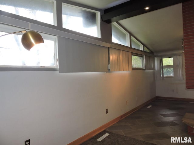 below grade area featuring baseboards