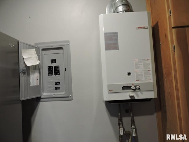 utility room with tankless water heater
