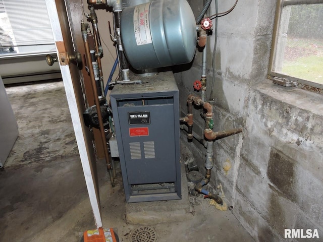 utility room with a heating unit