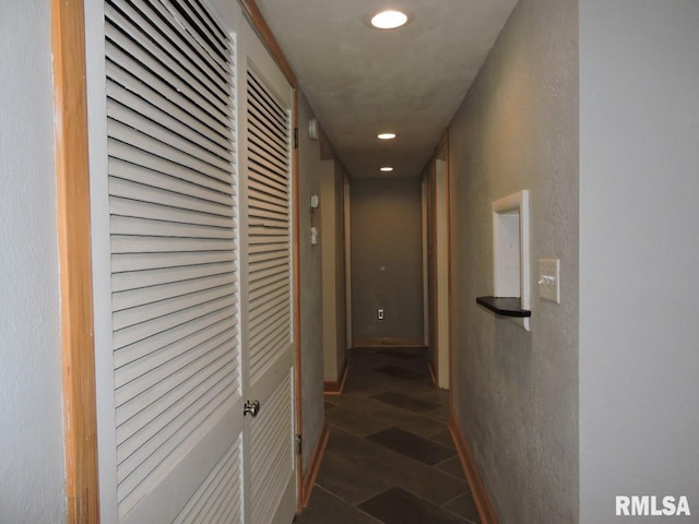 hall with recessed lighting