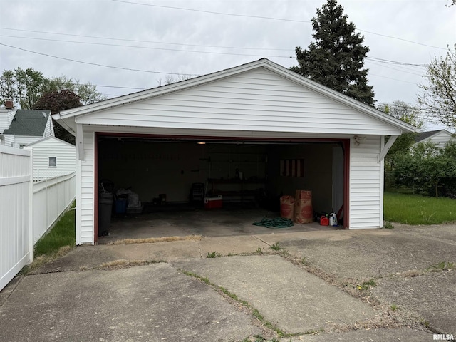 detached garage with fence