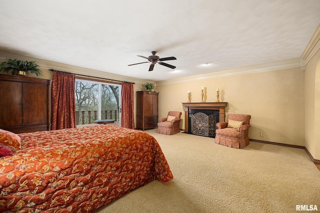 bedroom with crown molding, a fireplace, baseboards, and carpet floors