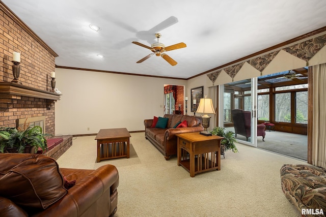 living room featuring a ceiling fan, ornamental molding, and carpet