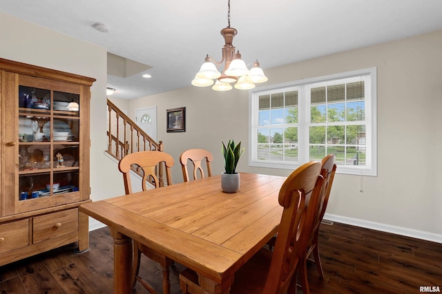 dining space with a chandelier, dark wood-style floors, stairway, baseboards, and recessed lighting