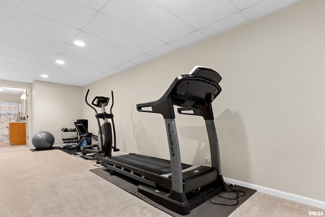 exercise room featuring carpet, recessed lighting, and baseboards