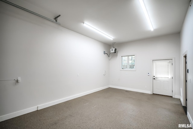 unfurnished room featuring baseboards