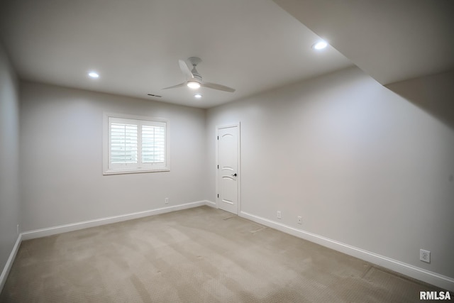 unfurnished room featuring light colored carpet, baseboards, a ceiling fan, and recessed lighting