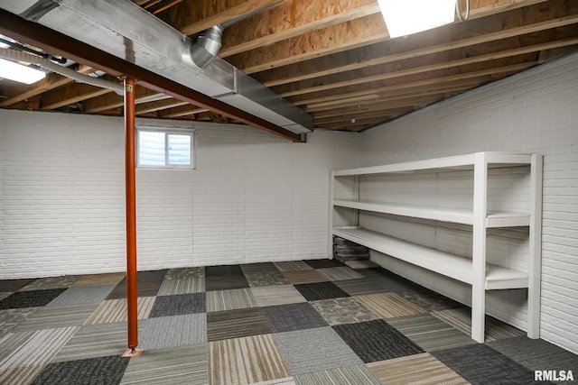 basement with dark carpet