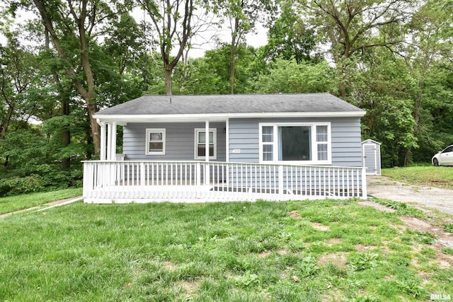 420 W Garfield Ave, Bartonville, IL 61607 - view of front facade featuring a front lawn and a porch