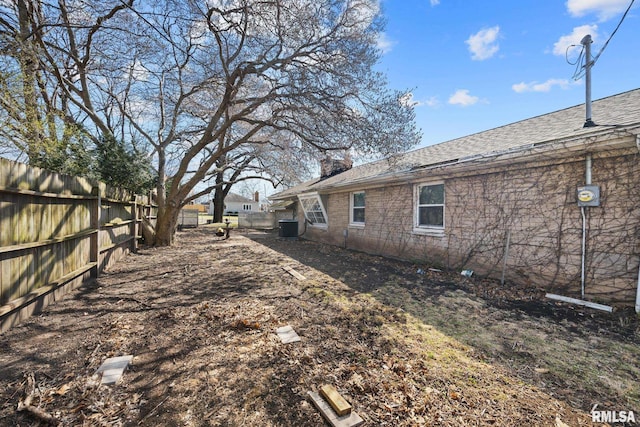 1420 N 10th St, Pekin, IL 61554 - view of yard featuring fence and central AC