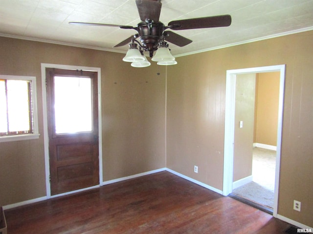 906 E Broadway St, Astoria, IL 61501 - interior space featuring a ceiling fan, baseboards, crown molding, and wood finished floors